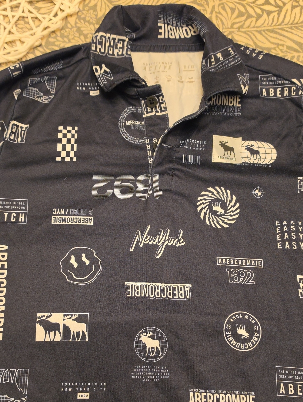 Abercrombie & Fitch Navy Polo with Cream Graphic Logos
